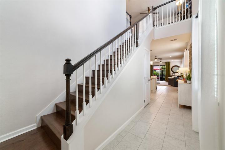 Staircase showcases the high ceilings!