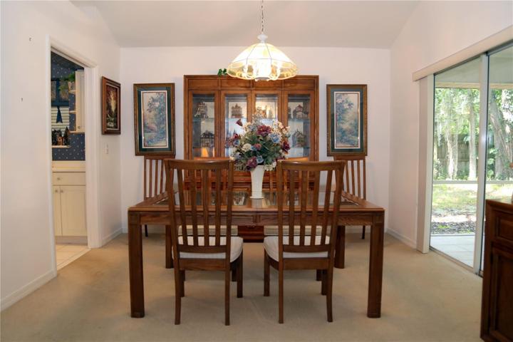 Dining Area with Sliding Doors to Screened Porch