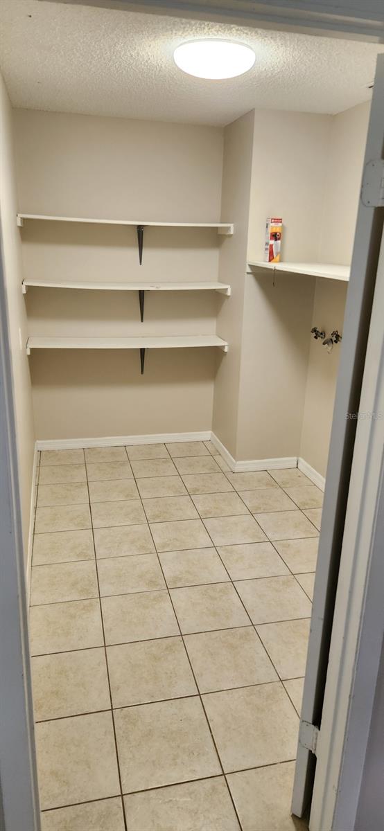 huge laundry room with storage