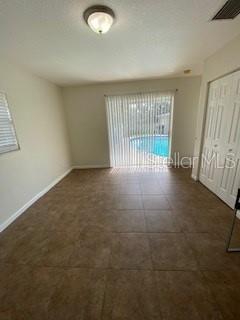 Bedroom 4 with sliding doors to pool