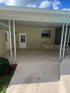 Covered Lanai-doors to garage and storage room