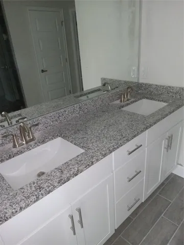 Double vanity in owner's suite!