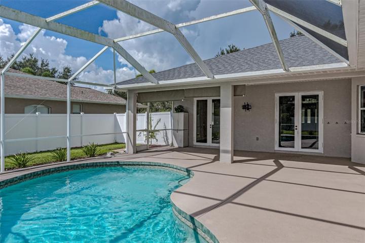 6412 91 Avenue East, Parrish, FL 34219 MLS # A4578299 Ancient OaksPool is perfect for entertaining, private pool bath and opens to both master suites and living room