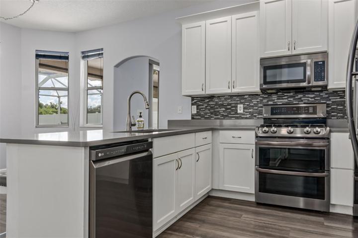 6412 91 Avenue East, Parrish, FL 34219 MLS # A4578299 Ancient OaksBreakfast bar and plenty of room for a dinette