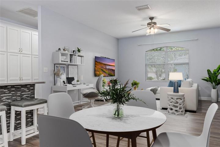 VIRTUALLY STAGED 6412-91 AVENUE EAST PARRISH, FL 34219 MLS#A4578299VIRTUALLY STAGED FAMILY ROOM OFF OF KITCHEN AND BREAKFAST NOOK