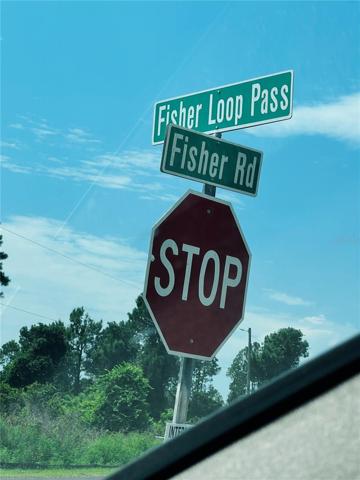 Directional sign. Corner lot