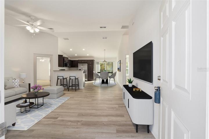 Virtually staged to give you an idea where to put furniture. This is same model different flooring