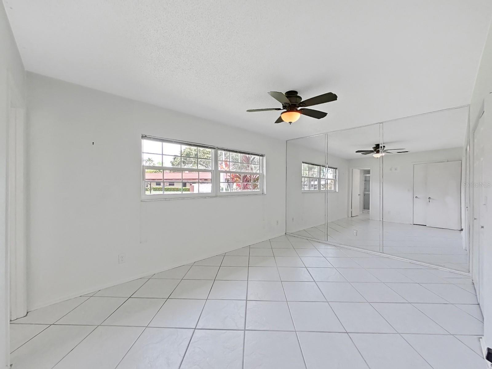Master Bedroom with two closets, one is a walk in closet
