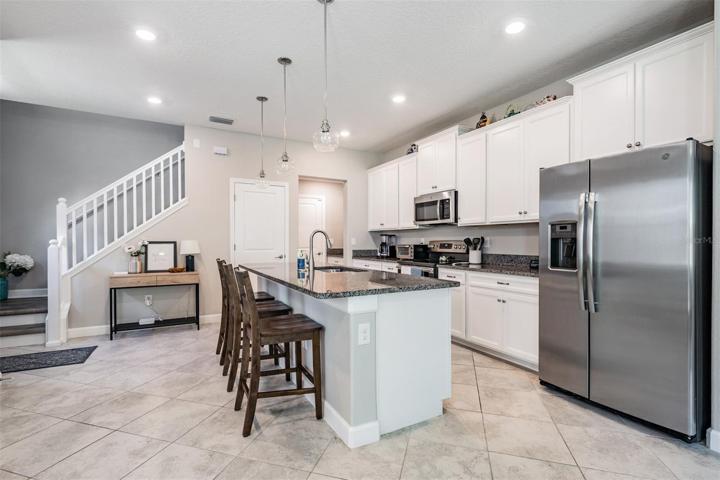 Kitchen toward the drop zone/garage