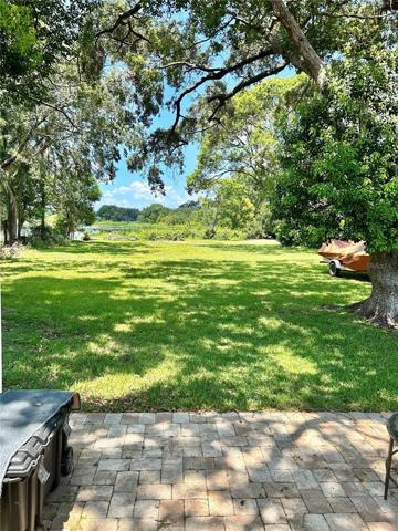 Brick paver patio, back yard, lake view