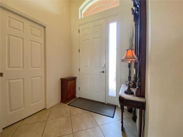 Pocket Door to Laundry Room. Front Door with Sidelight