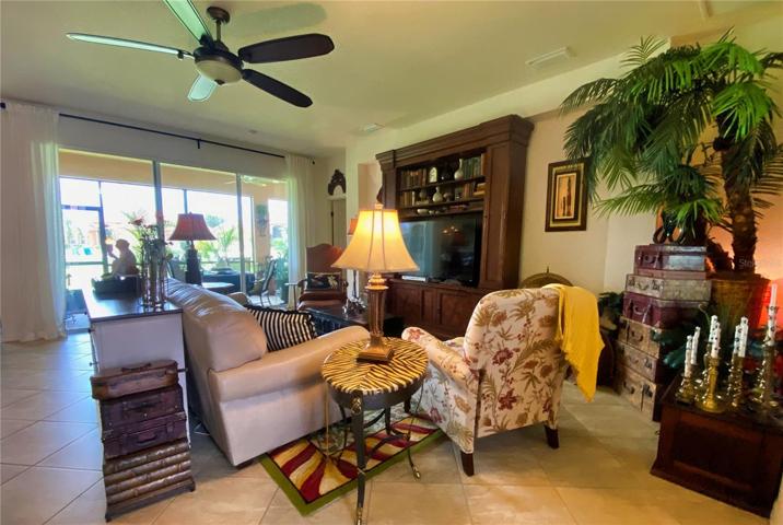 Living Room with triple sliders to Lanai