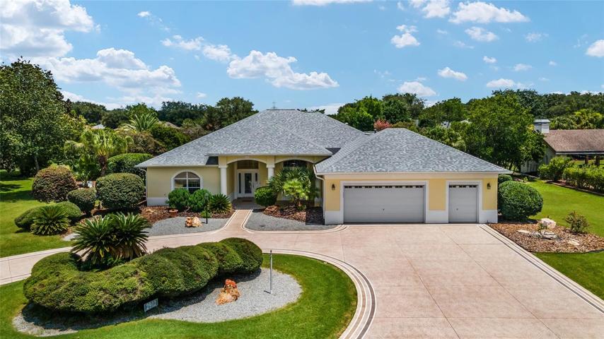 FABULOUS CUSTOM 3 BEDROOM AND 3 BATH ST. SIMONS PREMIER HOME WITH 40-FT POOL WITH WATERFALL, OVERSIZED 2-CAR+GOLF CART GARAGE IN THE SPECTACULAR VILLAGE OF HARMESWOOD OF BELLE AIRE!
