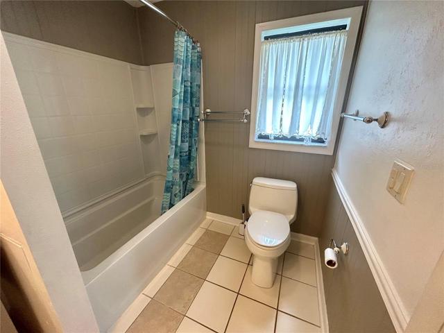 Master bath featuring some wainscotting