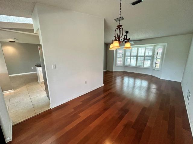 Dining room and living room. Also, entry to the kitchen