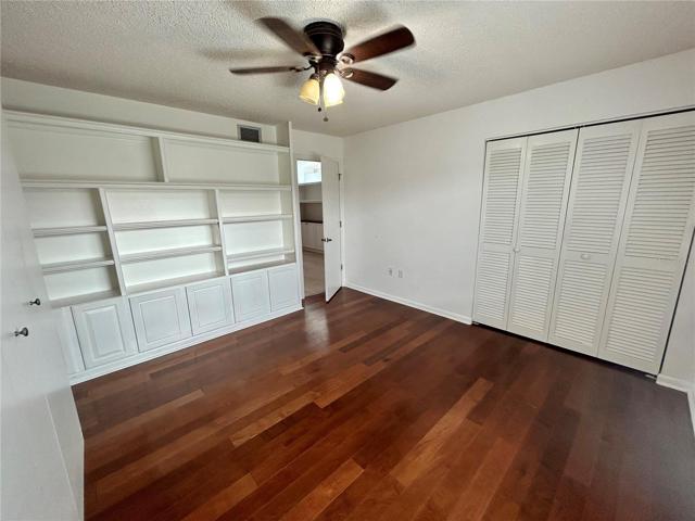 Bedroom #2. Murphy bed and custom built-ins for added storage and shelving for books, decor, etc.