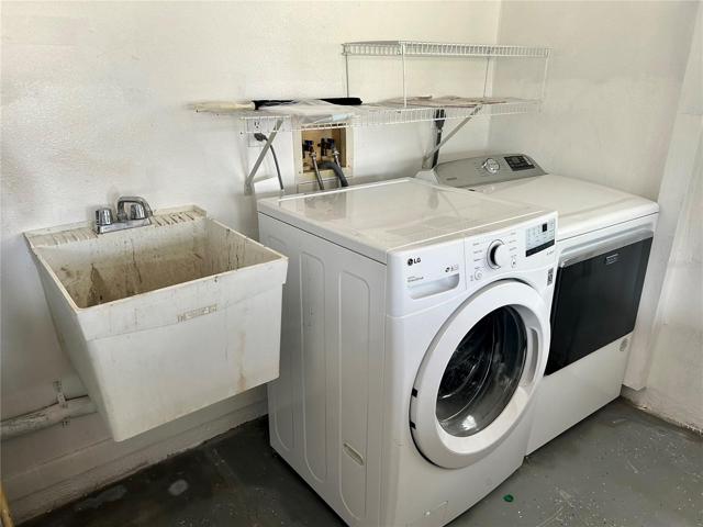 New washer and dryer located in the garage