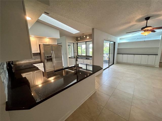 Kitchen and great room/family room. Notice the built-ins for added storage