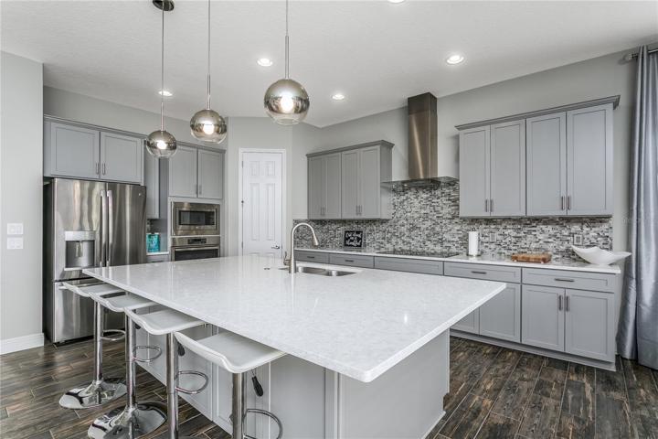 HUGE kitchen island - great for entertaining and add'l storage!