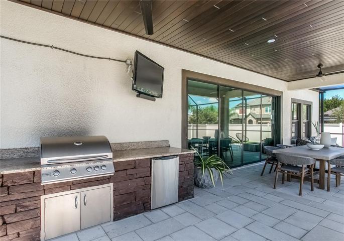 Custom outdoor grill area with refrigerator (2018-$15K)