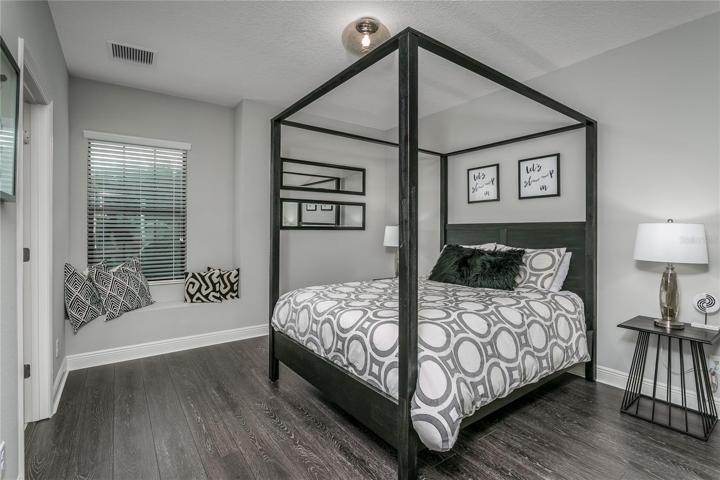 Bedroom 4 with adorable window seat.  Snuggle up and read a  book...