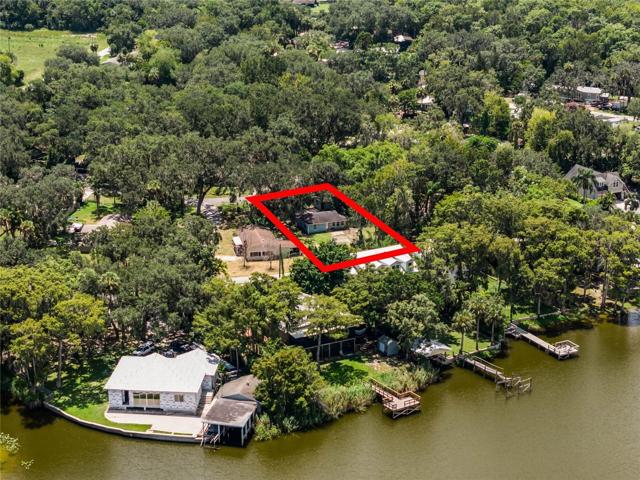 Unbeatable price for a single family home in Oviedo with LAKE JESSUP VIEWS! This 3BD/2BA home has great bones, metal exterior studs, triple insulated walls and attic and it is ready for someone to come in, complete the updates, choose the cosmetics and make it HOME!