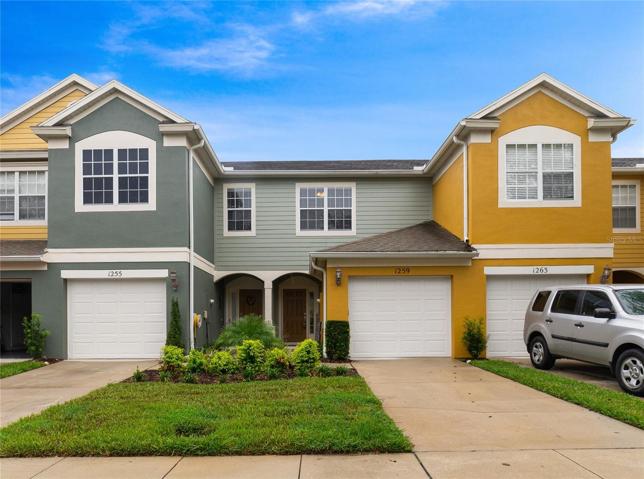 Welcome to Regency Oaks, a gated community in the heart of Sanford, and this beautiful townhome with a BRAND NEW ROOF (AUG 2023) and a newly PAINTED EXTERIOR (2022)!
