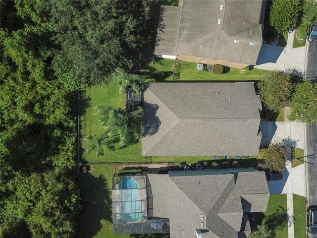 Updates throughout the home include INTERIOR PAINT (2022), A/C (2020), ROOF (2018), and a WHOLE-HOUSE OSMOSIS WATER SYSTEM (2018)!