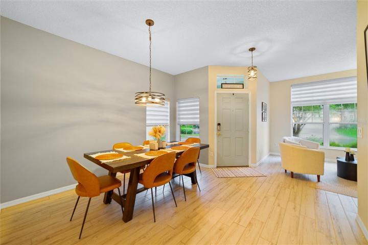 WOOD LOOK TILE FLOORING greets you as you enter the formal living and dining spaces; entertain guests or flexible to use however your family might need!