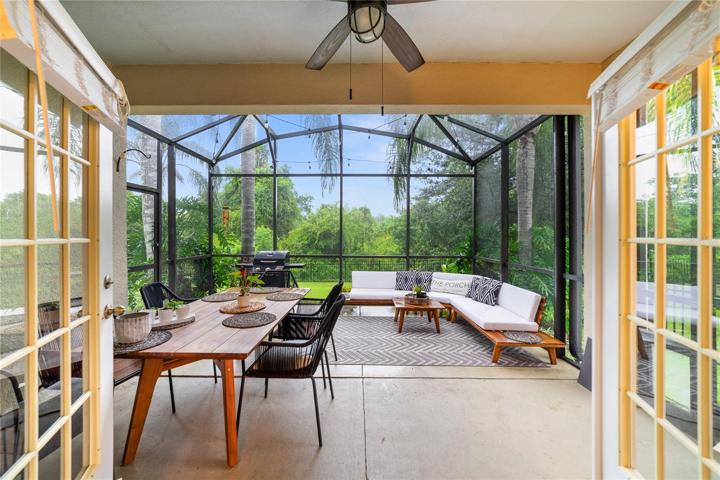 Before you tour the bedrooms step out onto the covered lanai and extended screened patio, overlooking a serene conservation lot for a wooded view, offering a tranquil escape from the hustle and bustle!