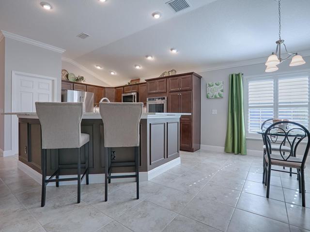 BREAKFAST BAR WITH CUSTOM TRIM ON THE FRONT
