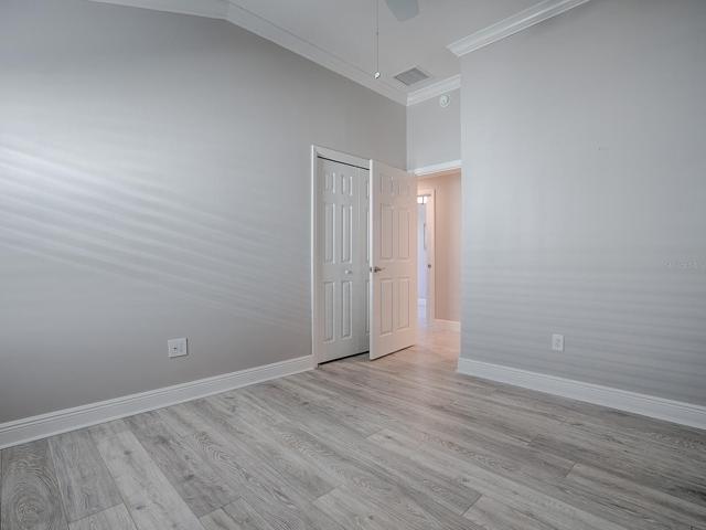 2ND GUEST ROOM WITH THE SAME LOVELY LAMINATE FLOORING, CROWN AND NICE SIZE CLOSET.