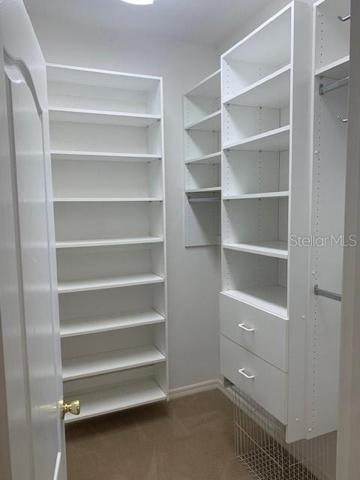 Ginormous walk-in closet in the Primary En Suite