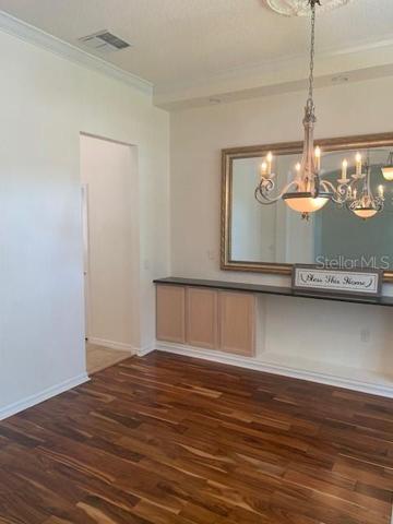 Dining Room to the right upon entry - built in cabinets.