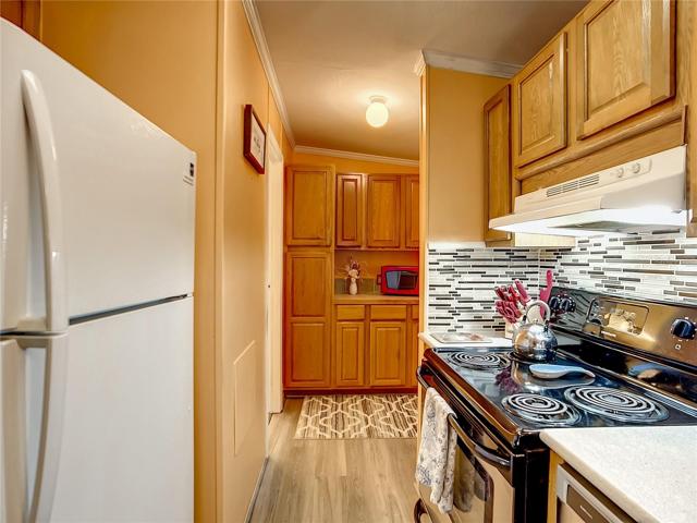 Kitchen with updated vinyl plank flooring
