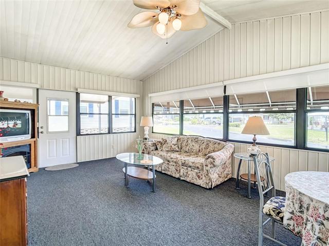 Florida room has shades and awnings