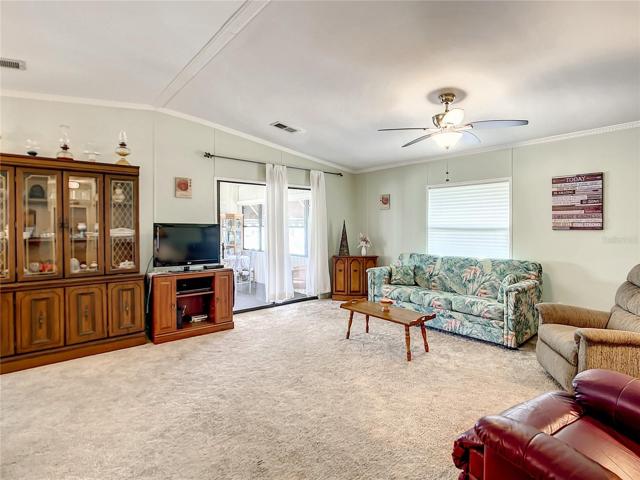 View from living room to sliding doors into FL room