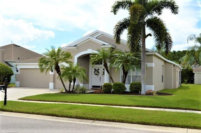 This 3 car garage home has a wonderful pond view in the gated community of Pine Glen.