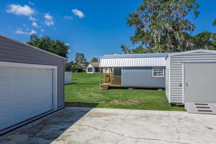 The first shed is a 10 x 12 and is connected to electricity.