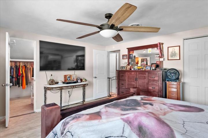 Master bedroom boasts a walk in closet and en-suite bath.