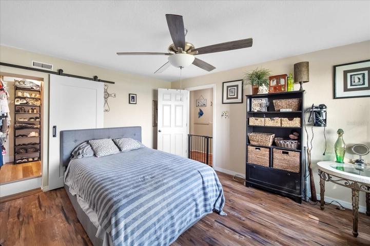 Just off the laundry, is the downstairs bedroom.  It is beautifully finished with lovely flooring, walk in closet and lots of space for comfortable and privacy.
