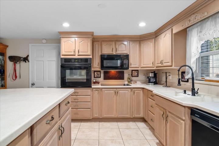 Counter space is abundant with Corian finish and super clean.