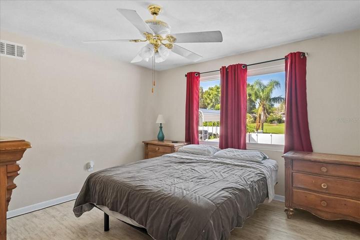 Soft paint tones and handsome matching laminate makes this room very comfortable for guests.