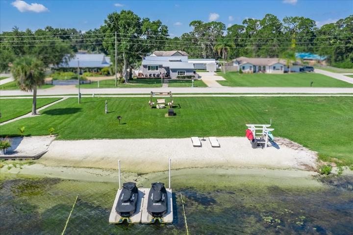 Stunning view of the property, showing the white sandy beach with  