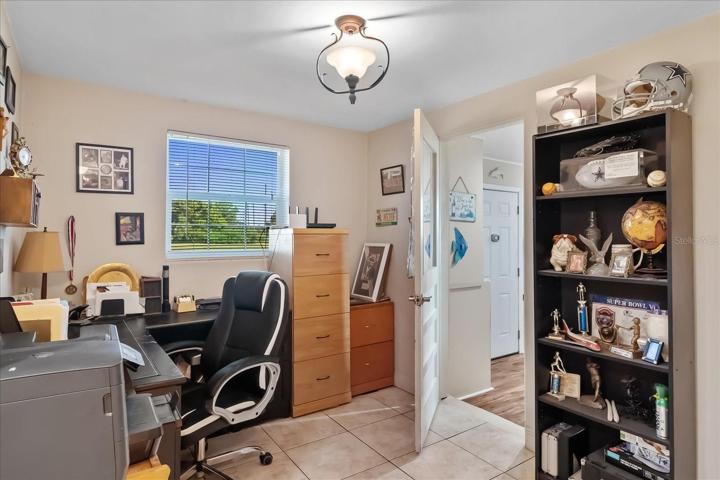 This room is good sized and the window allows a view of the outside and lets sunshine flow in.