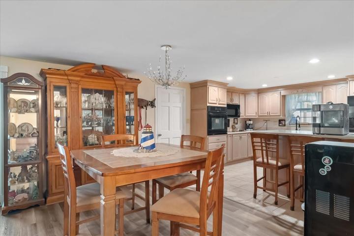 The Dining room is just off the kitchen for easy access.  Remember most of this furniture conveys with the sale.