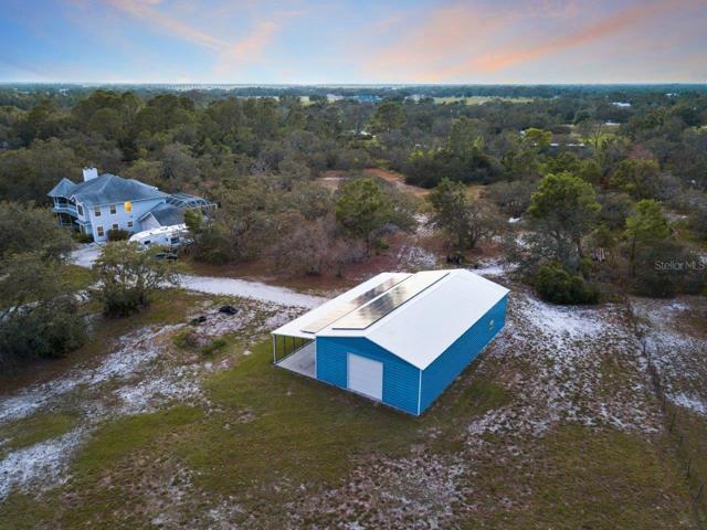 Arial of the 60'x30' Warehouse showing the 10' garage door.