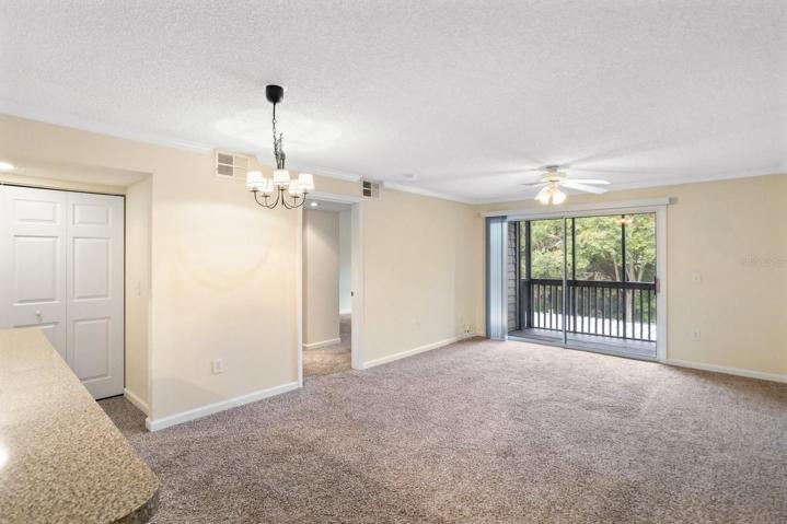 Dinette area with chandelier.