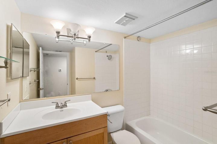 Guest bath has tub with shower too.