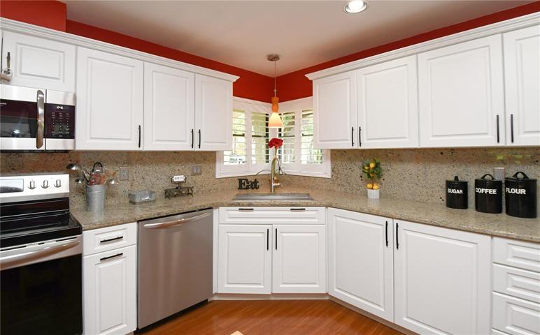 The family chef will find inspiration in the kitchen, a space adorned with a suite of luxury Frigidaire stainless steel appliances, including  a range, microwave, and dishwasher.